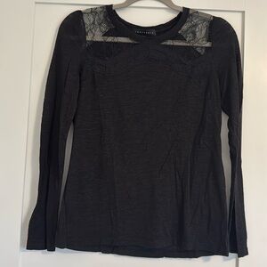 Sheer sanctuary top with lace detail.